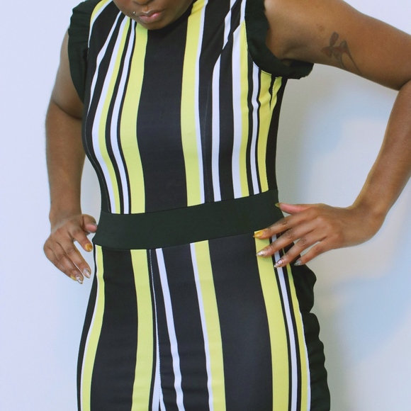 yellow jumpsuit with black stripe